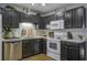 Well-maintained kitchen with stainless steel appliances and sleek cabinetry at 901 Elm Hall Cir, Summerville, SC 29483