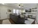 Inviting living room with comfortable sofa, modern decor, and ample natural light at 901 Elm Hall Cir, Summerville, SC 29483