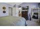 Inviting main bedroom featuring a serene atmosphere with a large bed, dresser, and ample closet space at 901 Elm Hall Cir, Summerville, SC 29483