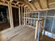 Attic area under construction featuring wood framing, insulation and wiring at 909 Dusk Dr, Summerville, SC 29486