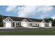 Charming townhomes featuring attached garages, inviting exteriors, and well-manicured landscaping, perfect for modern living at 911 Dusk Dr, Summerville, SC 29486
