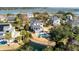 Beautiful aerial view of a home with a pool and pond, nestled amongst trees and overlooking the bay at , Charleston, SC 29412