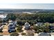 A lovely waterfront home surrounded by mature trees with water views of the marsh and Charleston in the distance at , Charleston, SC 29412