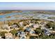 A beautiful aerial view of a neighborhood with waterfront access and luscious green trees at , Charleston, SC 29412