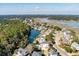 Aerial view of a waterfront property featuring a pond, with a blue-green river as the backdrop at , Charleston, SC 29412