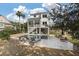 Serene backyard oasis boasting a pristine pool, stylish lounge chairs, and meticulously manicured landscaping for outdoor enjoyment at , Charleston, SC 29412