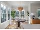 Bright dining area has large windows for natural light and modern chandelier at , Charleston, SC 29412