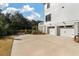Home featuring a large driveway and a three-car garage, surrounded by well-maintained landscaping at , Charleston, SC 29412