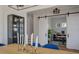 Hallway view with a sliding barn door to the office, a display cabinet, and stairs at , Charleston, SC 29412
