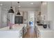 Bright kitchen featuring an island with seating, stainless appliances, and modern pendant lighting at , Charleston, SC 29412