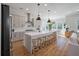 Open kitchen featuring a large island with seating, pendant lights, and modern appliances at , Charleston, SC 29412
