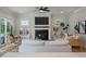 Living room has a fireplace and TV, with modern furniture and a neutral color scheme at , Charleston, SC 29412