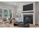 Comfortable living room with fireplace and access to outdoor deck area at , Charleston, SC 29412
