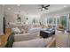 Spacious open-concept living room with kitchen and access to outdoor deck at , Charleston, SC 29412