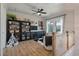 Open loft space with hardwood floors, a ceiling fan, and built-in shelving at , Charleston, SC 29412