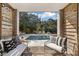 Relaxing patio area offering views of the pool, backyard, and peaceful surroundings at , Charleston, SC 29412