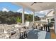 Welcoming screened porch featuring comfortable seating and scenic views of the surrounding landscape at , Charleston, SC 29412