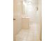 Bright bathroom with white tile, vanity, toilet, and modern fixtures at 105 Pinewood St, Walterboro, SC 29488