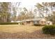 Charming one story home with a brown roof and classic front yard at 105 Pinewood St, Walterboro, SC 29488