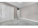 This bedroom features carpet, neutral paint, and a closet with white doors at 110 Instructor Ct, Ladson, SC 29456