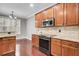 Modern kitchen featuring stainless steel appliances, granite countertops, and lots of natural light at 110 Instructor Ct, Ladson, SC 29456