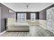 Spacious bedroom with neutral decor, two windows, private outdoor access and lots of light at 110 Instructor Ct, Ladson, SC 29456