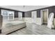 Bedroom with neutral walls, light gray floors, and a walk-in closet with french door at 110 Instructor Ct, Ladson, SC 29456