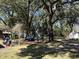 Lush backyard featuring a custom built covered seating area at 111 Newington Rd, Summerville, SC 29485