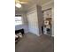 Bedroom with closet, shelves, and natural light from the window; an organized and well-lit space at 111 Newington Rd, Summerville, SC 29485