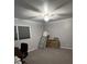 Spacious bedroom with neutral gray walls, carpet and filled with unpacked boxes and furniture at 111 Newington Rd, Summerville, SC 29485