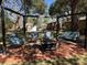 Inviting backyard fire pit with swing set, perfect for outdoor gatherings at 111 Newington Rd, Summerville, SC 29485