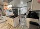 Charming eat-in kitchen with island, modern appliances, and cozy breakfast nook at 111 Newington Rd, Summerville, SC 29485