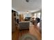 Spacious living room offers natural light, hardwood floors, and cozy seating at 111 Newington Rd, Summerville, SC 29485