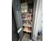 Pantry room is fully stocked with ample storage on shelving and racks at 111 Newington Rd, Summerville, SC 29485