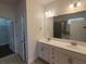 Bathroom with double sinks, vanity, and walk-in shower at 113 Doral Blue Dr, Summerville, SC 29483