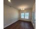 Well-lit dining room with hardwood flooring, molding, and large windows at 113 Doral Blue Dr, Summerville, SC 29483