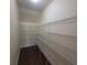 Walk-in pantry with wire shelving for ample storage space at 113 Doral Blue Dr, Summerville, SC 29483