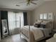 Vaulted ceiling bedroom featuring a luxurious four-poster bed and plush linens at 120 Hornby Cir, Goose Creek, SC 29445