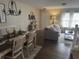 Open-concept living and dining area with hardwood floors and comfortable seating at 120 Hornby Cir, Goose Creek, SC 29445