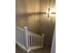 Bright staircase with white railing and modern light fixture at 120 Hornby Cir, Goose Creek, SC 29445