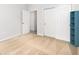 A bright bedroom with a large closet and neutral paint and flooring at 1225 Blakeway St # 403, Charleston, SC 29492