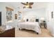 Comfortable bedroom with two windows, a ceiling fan, and a queen-sized bed with stylish decor at 1225 Blakeway St # 403, Charleston, SC 29492