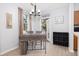Bright dining nook featuring a contemporary chandelier and an adjacent outdoor patio at 1225 Blakeway St # 403, Charleston, SC 29492