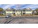 Well-maintained multi-Gathering building with ample parking, manicured landscaping, and charming curb appeal at 1225 Blakeway St # 403, Charleston, SC 29492