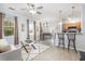 Open-concept space with a spacious living room, dining area, and kitchen with bar stool seating at 1225 Blakeway St # 403, Charleston, SC 29492