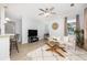 Inviting living room features neutral decor, plush rug, and ample natural light at 1225 Blakeway St # 403, Charleston, SC 29492