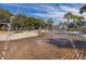 A charming splashpad in a public park, featuring a variety of trees, clear skies and walking paths at 1225 Blakeway St # 403, Charleston, SC 29492