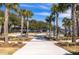 A delightful public park featuring a splash pad, a variety of trees, clear skies and walking paths at 1225 Blakeway St # 403, Charleston, SC 29492