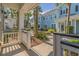 Charming front patio with tropical landscaping and tranquil views of the community at 1225 Blakeway St # 403, Charleston, SC 29492