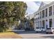 Picturesque street view of a building and large trees in a neighborhood setting at 1225 Blakeway St # 403, Charleston, SC 29492